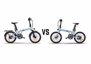 A variety of electric scooters lined up for comparison, showcasing different styles and colors.