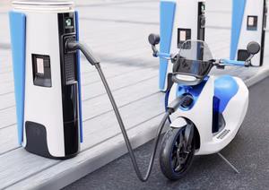 An electric motorcycle parked on a city street, showcasing modern design and eco-friendly features.