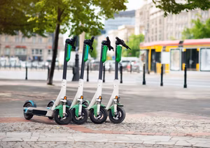 A side-by-side comparison chart of e-scooter rental and purchase costs.